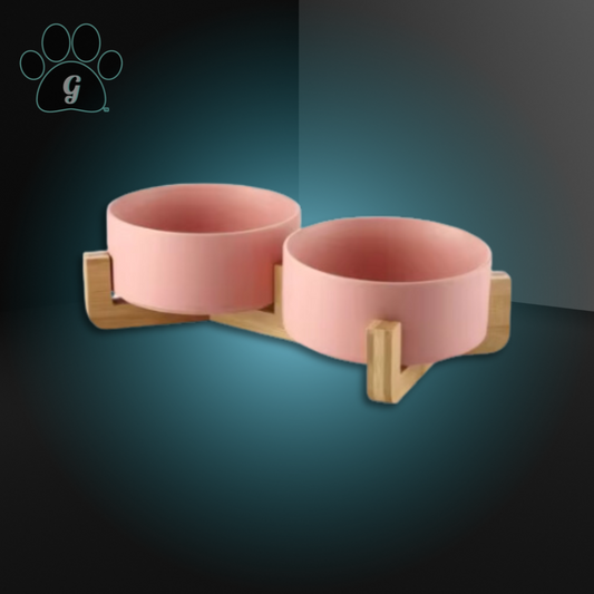 pink ceramic bowls on wooden stand