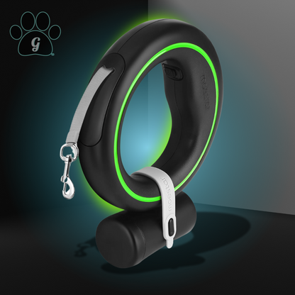 black circular retractable leash with attached bag dispenser and green LED light