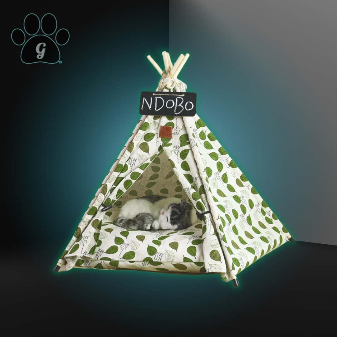 white pet tipi tent with green leaves