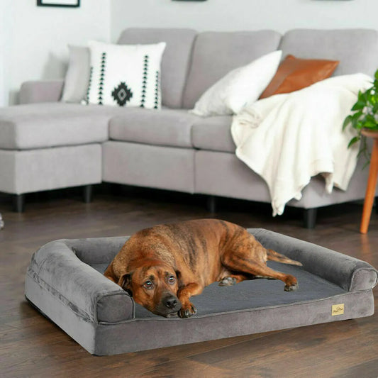 Gray orthopedic bolster dog bed for large dogs.