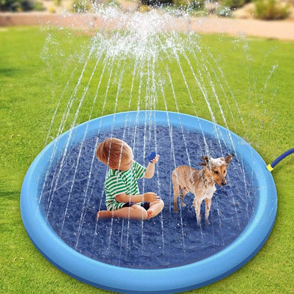 Baby and dog playing in sprinkler pad