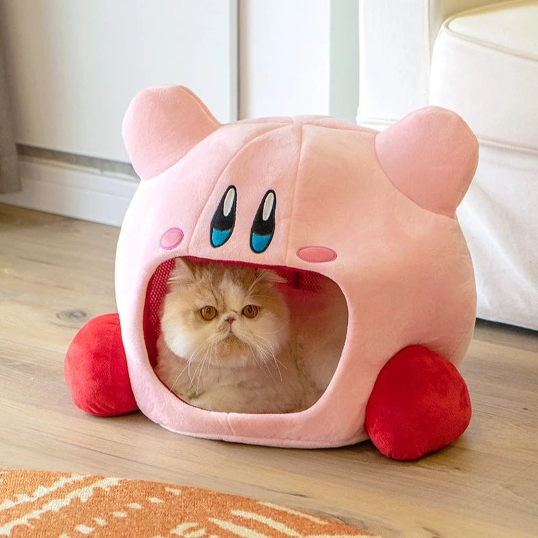 semi enclosed Kirby cat bed with cat inside