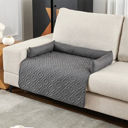 gray partial patterned couch cover with bolsters