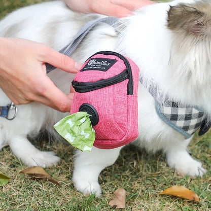 Product shown in pink clipped to the side of a small dog.