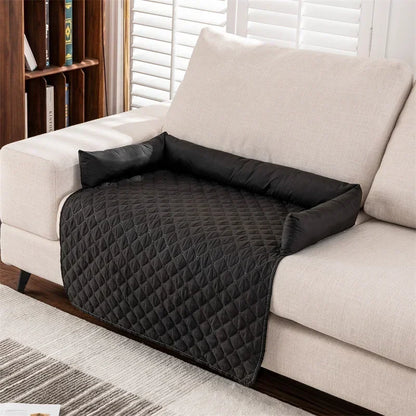 black partial patterned couch cover with bolsters