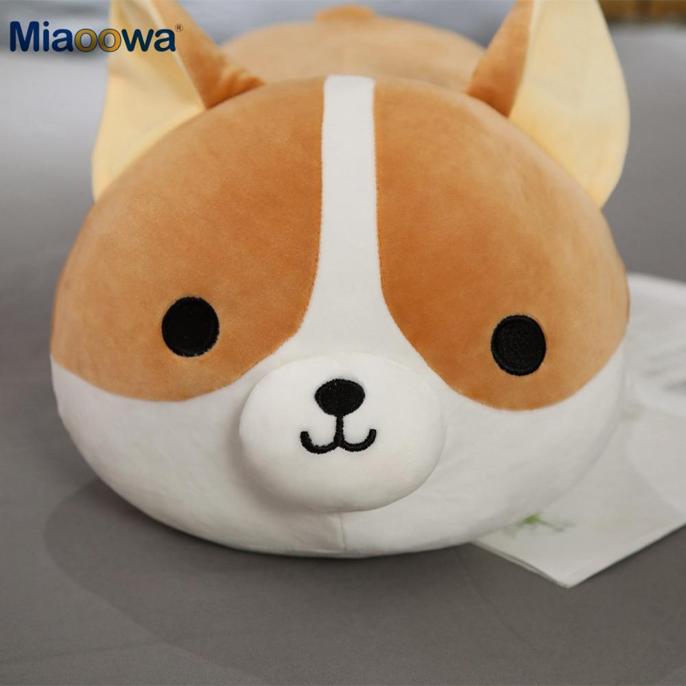 close up front view of plush corgi stuffed animal toy