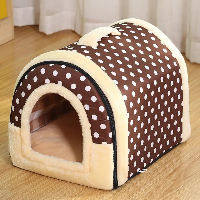 Brown enclosed cat bed with white polka dots