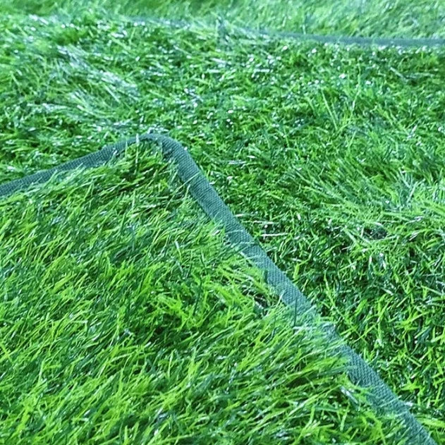 artificial grass pads stacked on top of each other