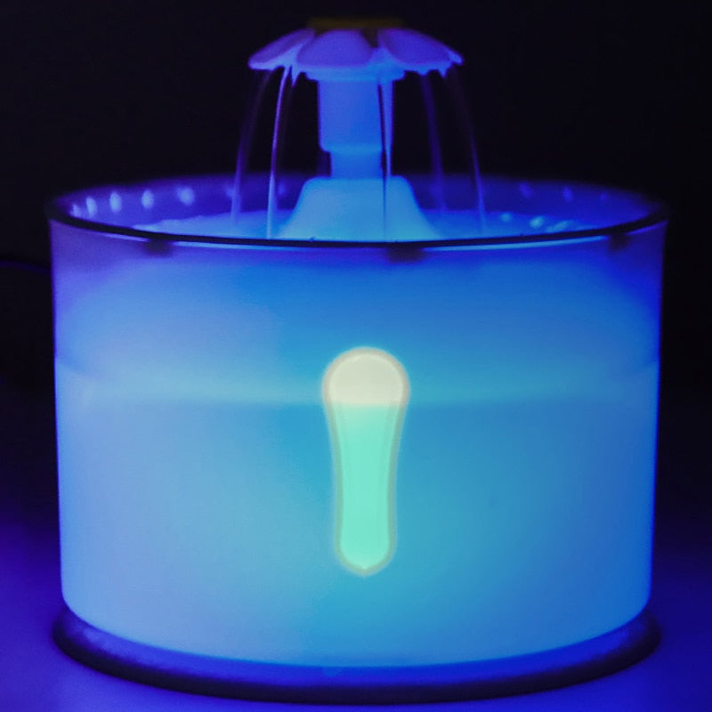 pet fountain shown with LED light on in the dark