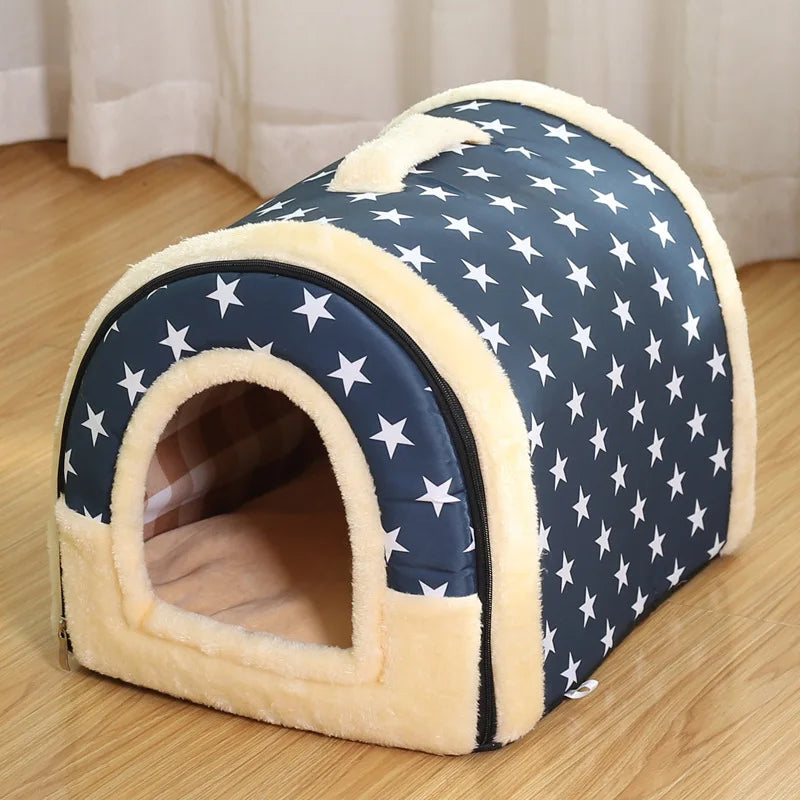 Blue enclosed cat bed with white stars