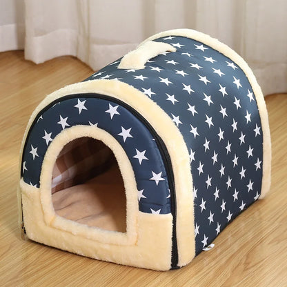 Blue enclosed cat bed with white stars