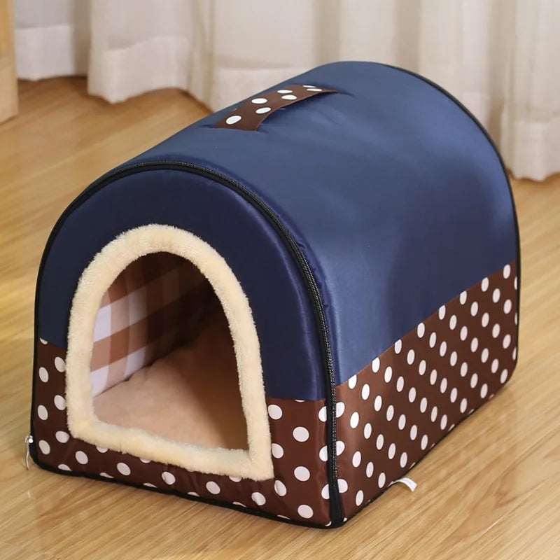 Blue and brown enclosed cat bed with white polka dots